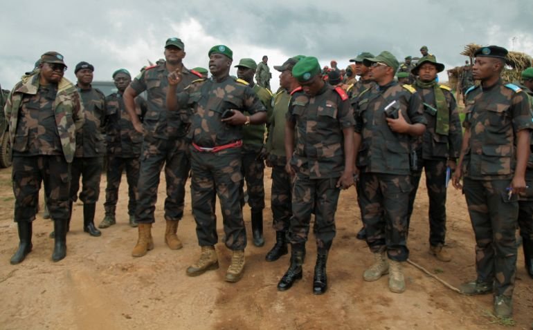 FILE PHOTO: Congolese army commander Jerome Chico Tshitambwe leads members of the Armed Forces of the Democratic Republic of the Congo (FARDC), as they assess the positions against the M23 rebel group in Lubero, North Kivu province of the Democratic Republic of Congo October 27, 2024. REUTERS/Djaffar Al Katanty/File Photo